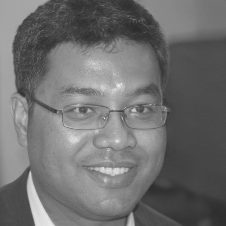 QA specialist Lachlan Sorensen reviewing mobile app test results