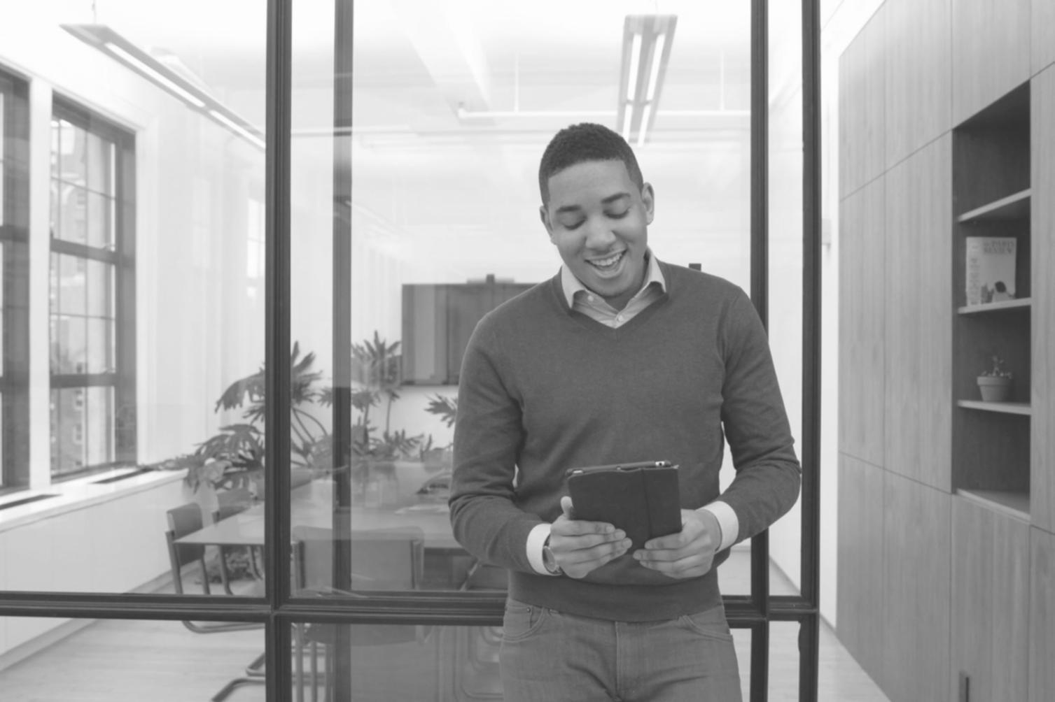 Testing facility showing organized device arrays and workstations